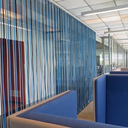 Blue rope curtain room divider office